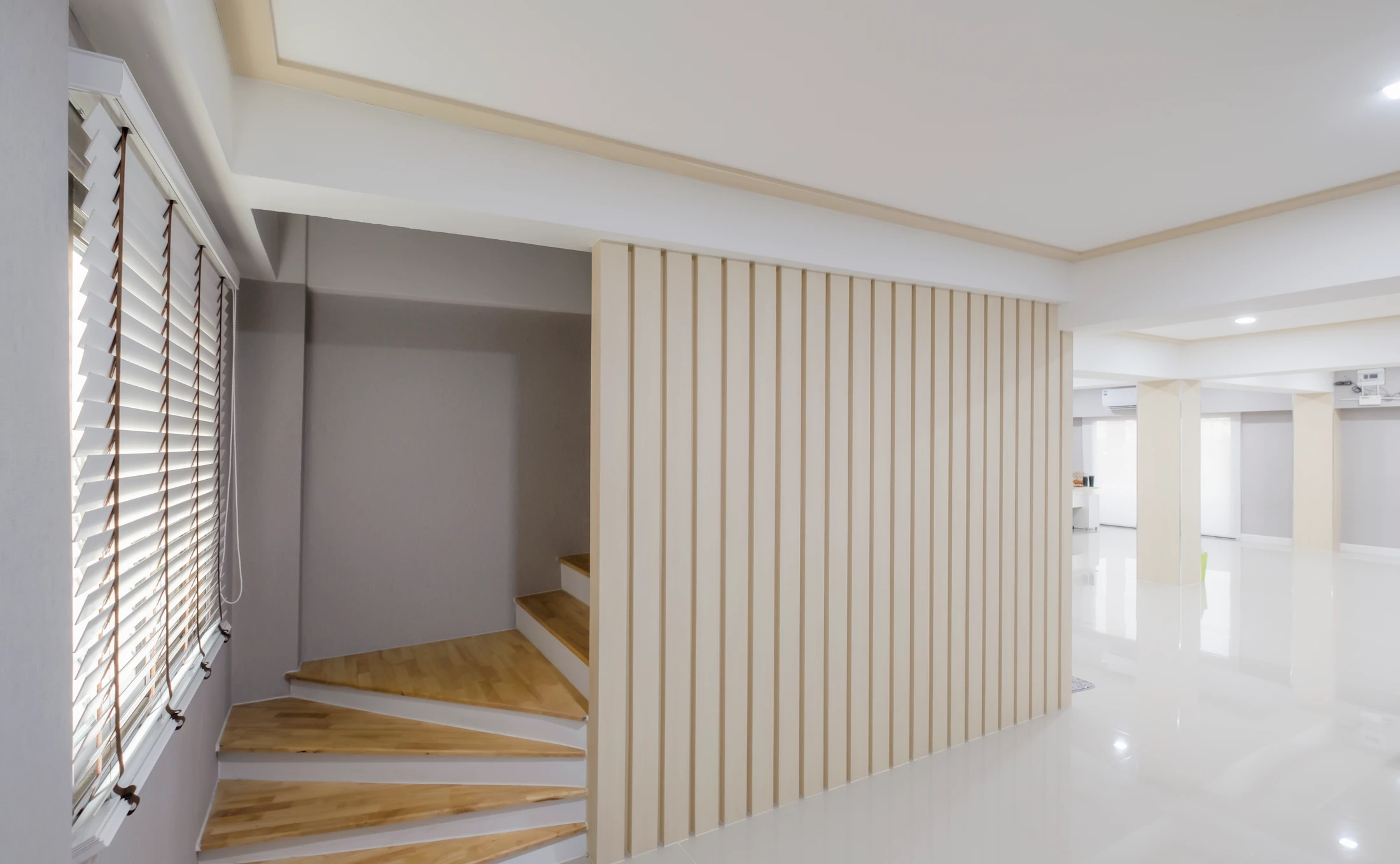 Finished residential home exterior showcasing premium wall cladding and rendering by Rescon Solutions.